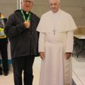 Fr Denis Metzinger with one of the photos of Pope Francis (Philadelphia 2015)