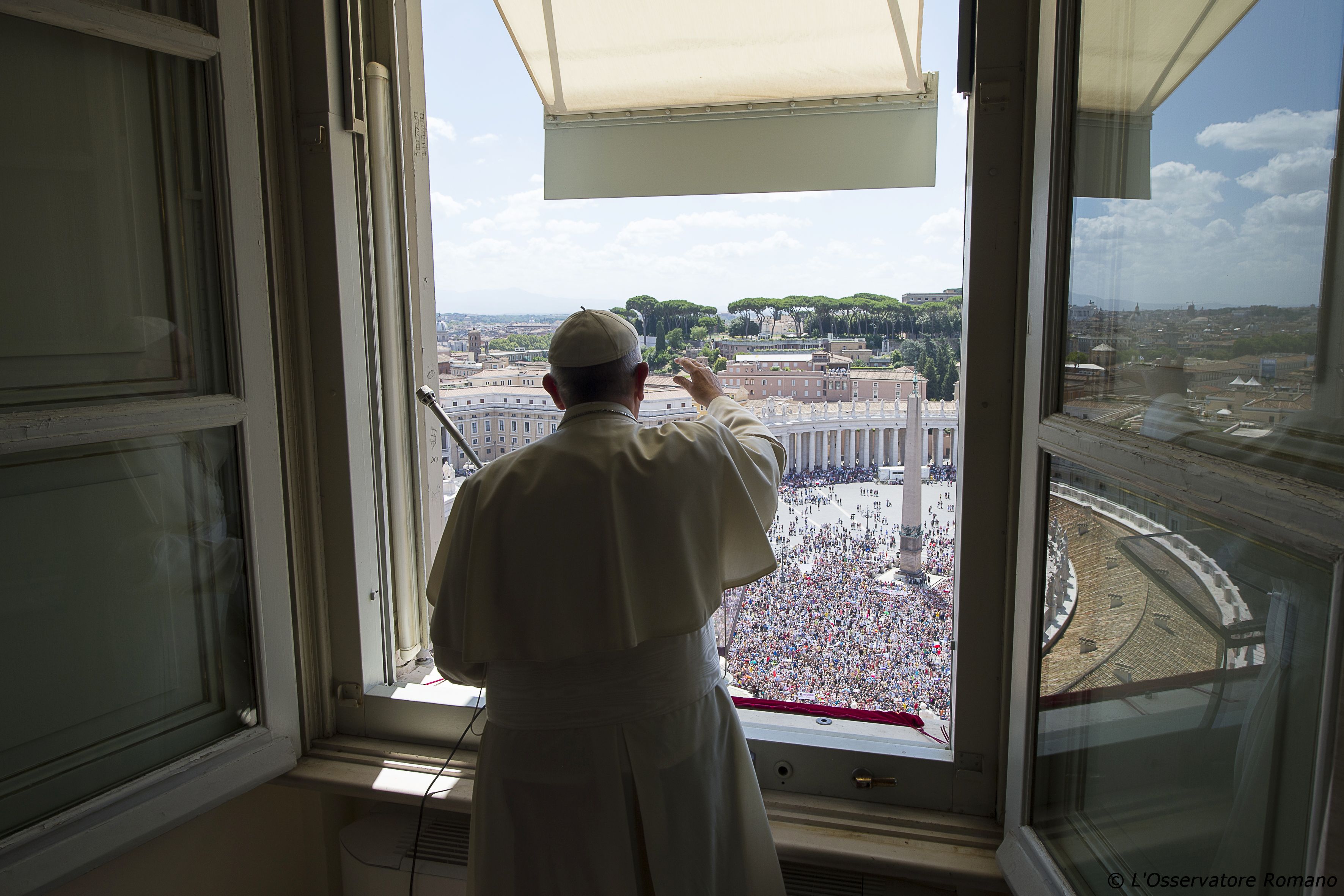 Pope Francis greets the faithful during the Angelus of Sunday 26th of July 2015