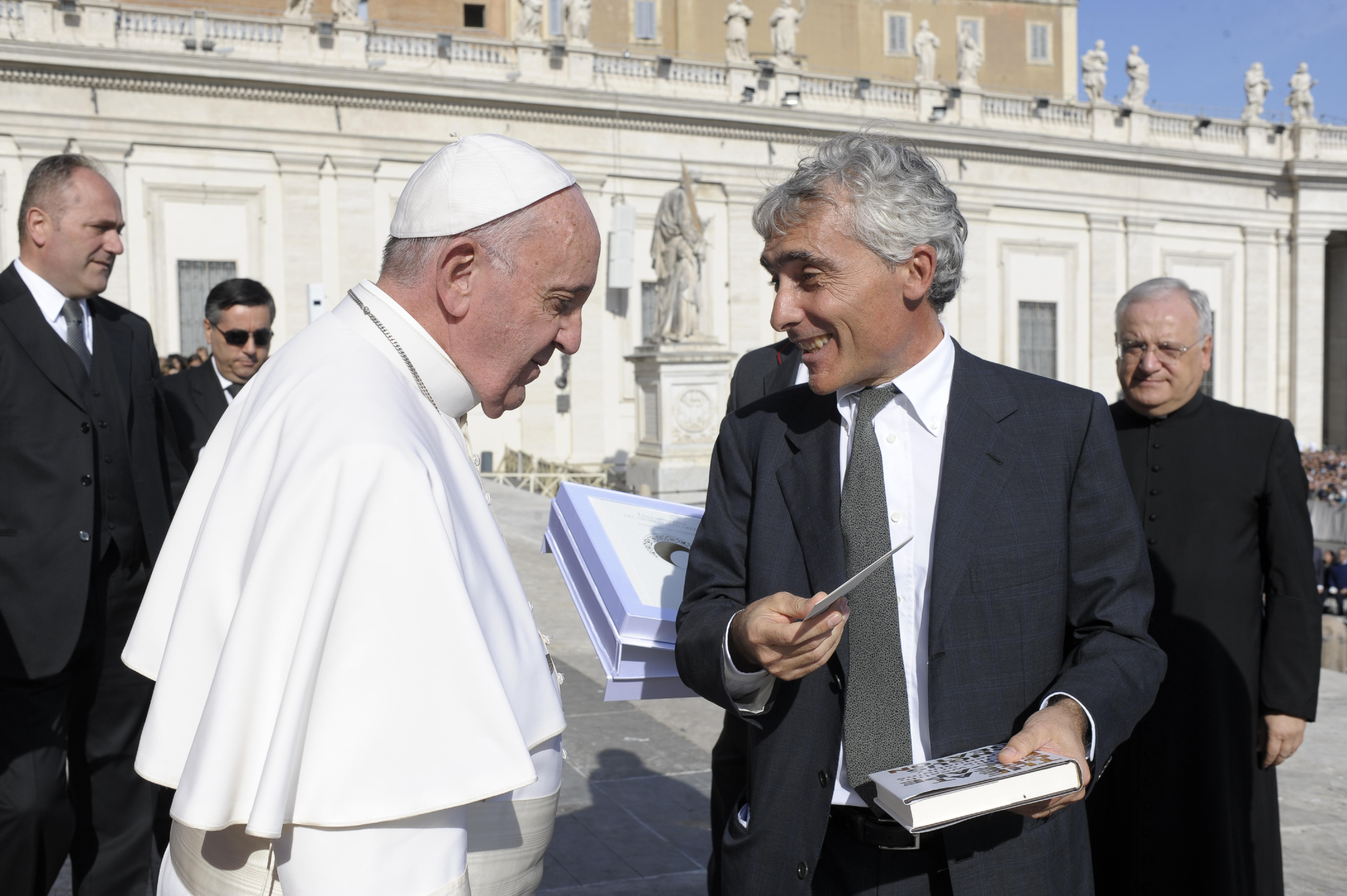 Pope Francis greets the head of the Italian National Social Security Institute or INPS