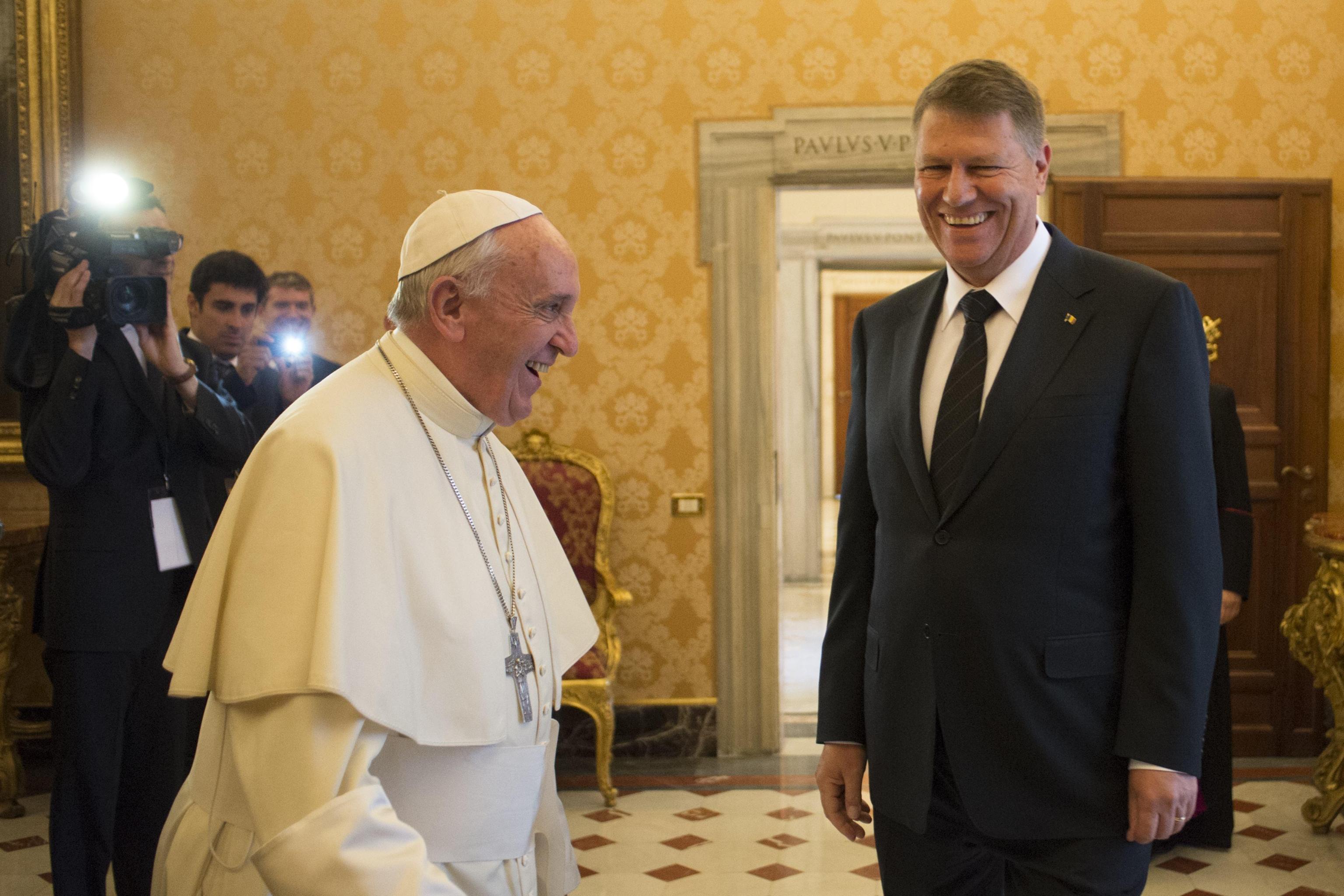 Pope Francis meeting Romanian President Klaus Werner Iohannis during a private audience in the pontiff's studio