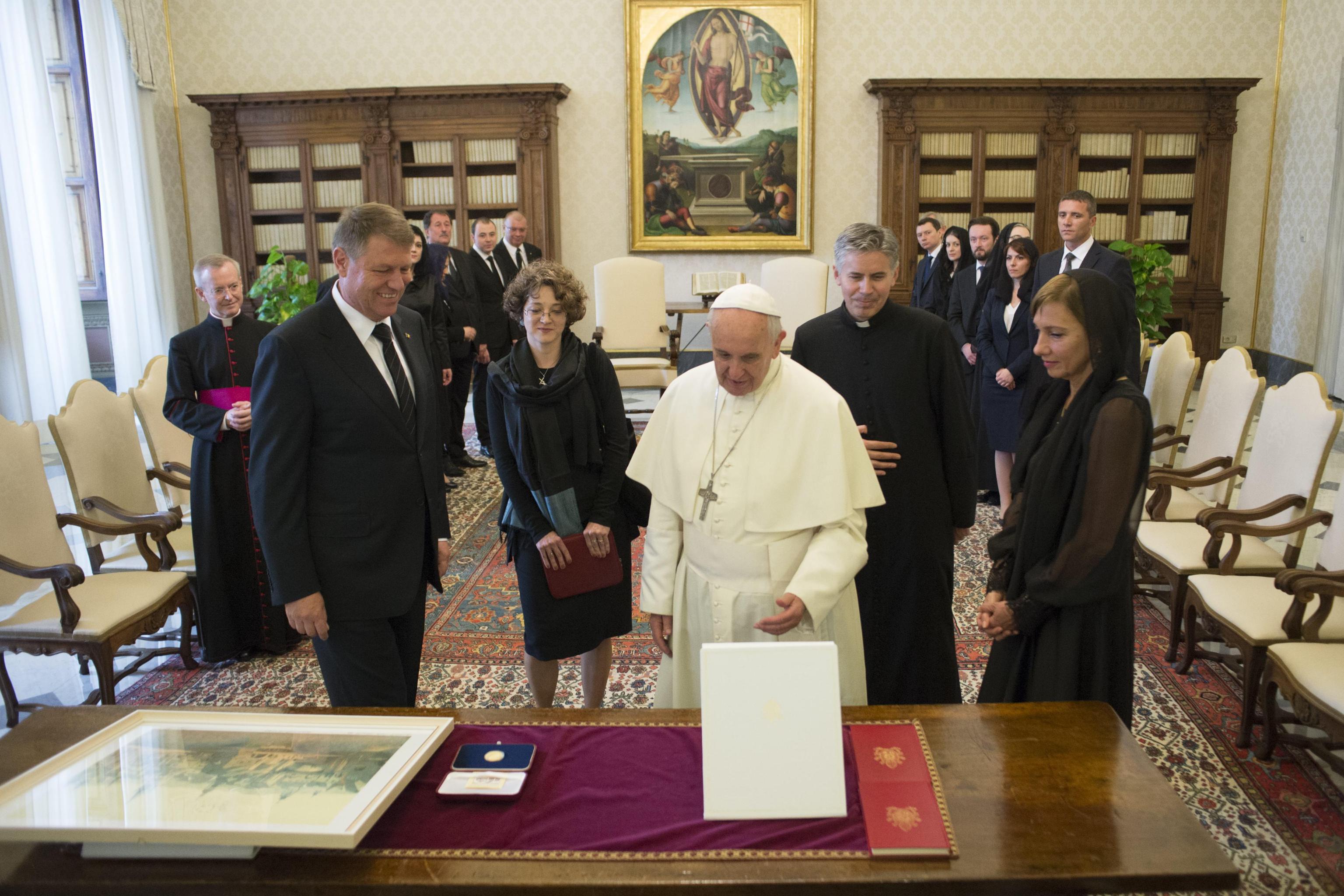 Pope Francis meeting Romanian President Klaus Werner Iohannis during a private audience in the pontiff's studio