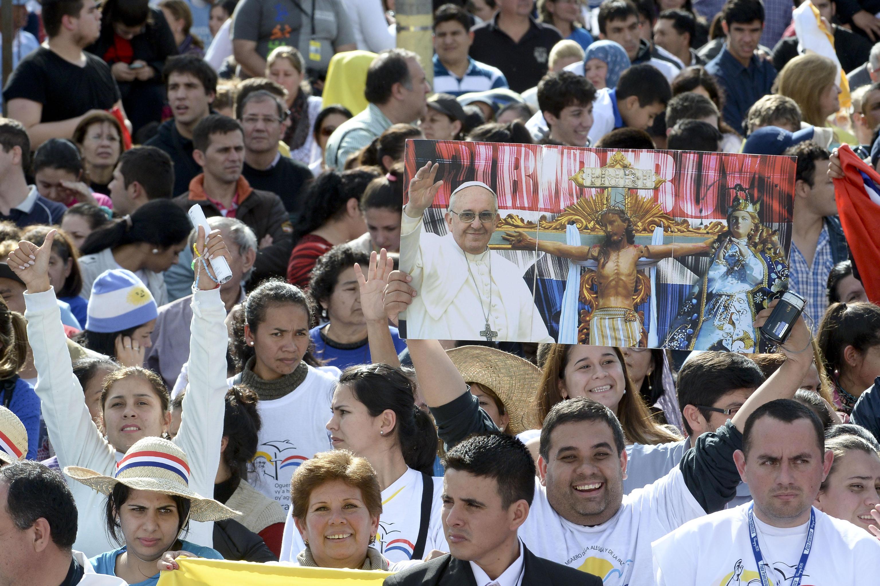 Faithfull wait for Pope Francis prior the Mass at the Shrine of the Virgin of Caacupe