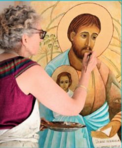 Violaine Vaganay travaillant sur la Fresque Saint Joseph à Saint Ouen (93)