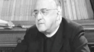 L'abbé Lemaître lors d’une interview en 1964 ©  VRT / Capture Youtube