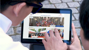 Le portail d’inscription des JMJ Séoul 2027 affiché sur une tablette. © WYD Seoul 2027 LOC